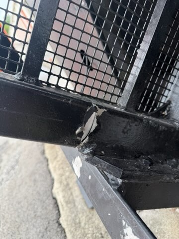 Gate leaning off track showing full derailment