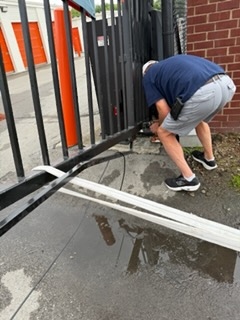 Gate repair work at base — structural repair