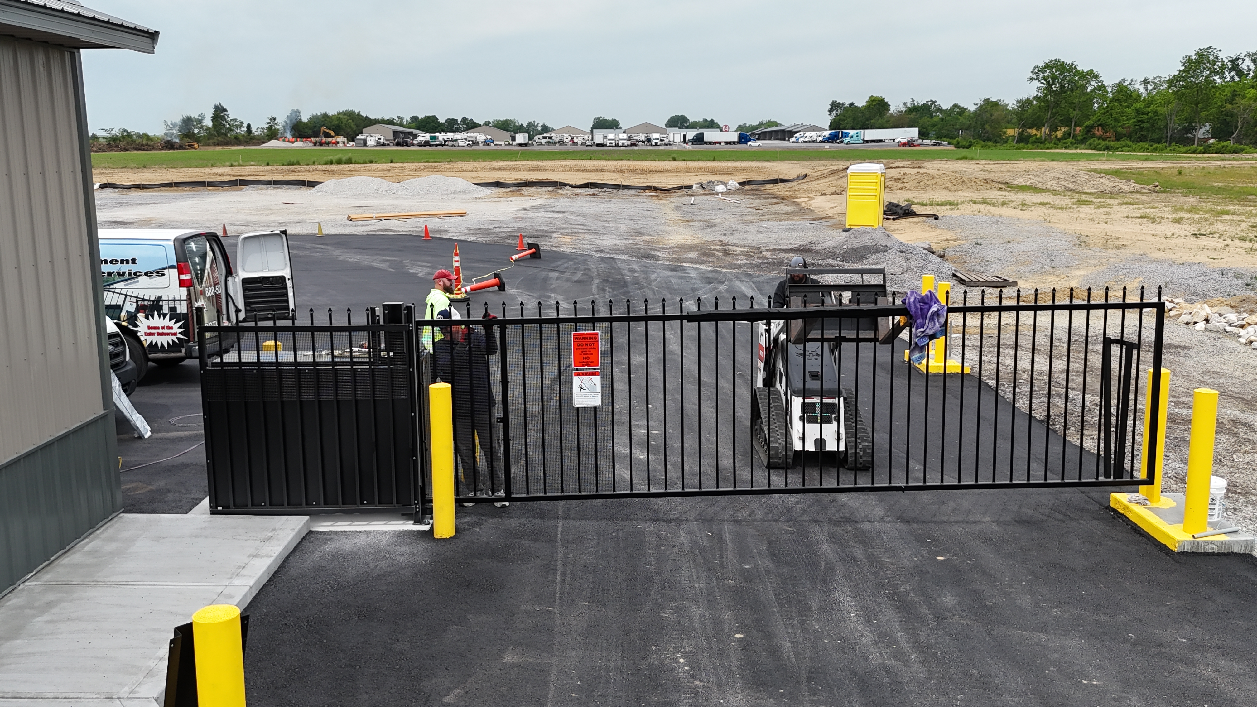 Approach view of a vertical pivot gate installation