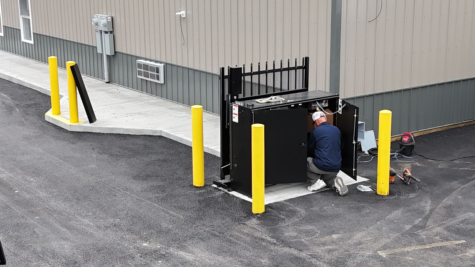 Wide view of a completed gate install at a self-storage facility